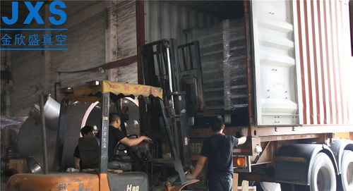 Son şirket haberleri hakkında JXS Vakum Seramik Karo PVD Kaplama Makinesi İran'a Gönderildi